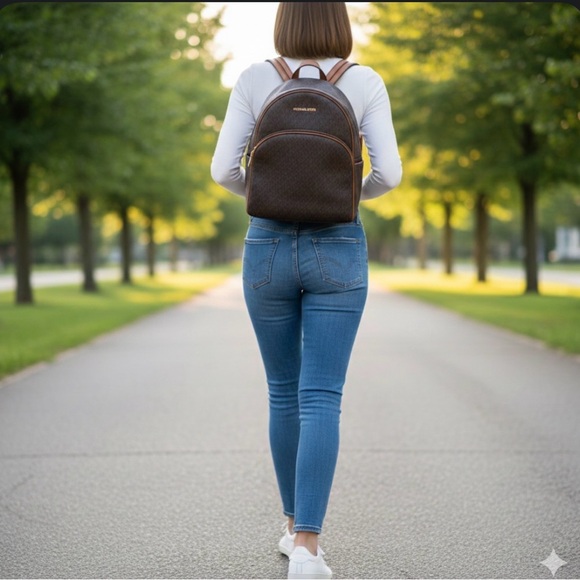 Michael Kors Handbags - Michael Kors Dark Brown Logo Backpack NWT